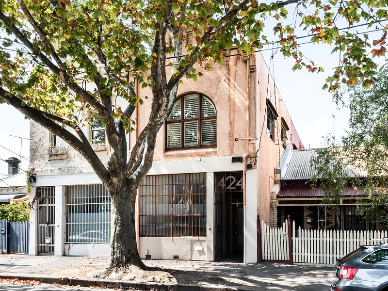 Landmark c1910 warehouse conversion in a prized Fitzroy North position