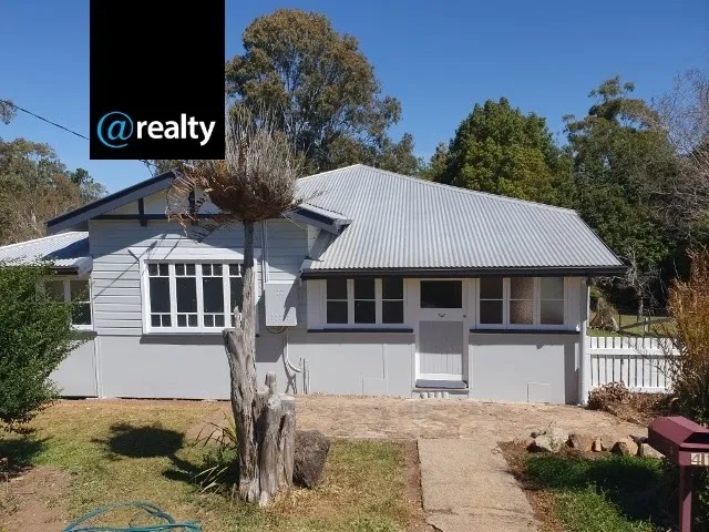 A house in town with a creek!