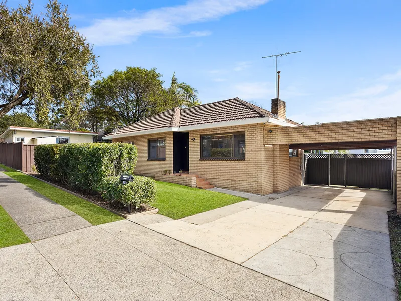 A charming family home with guest retreat & a private, level yard