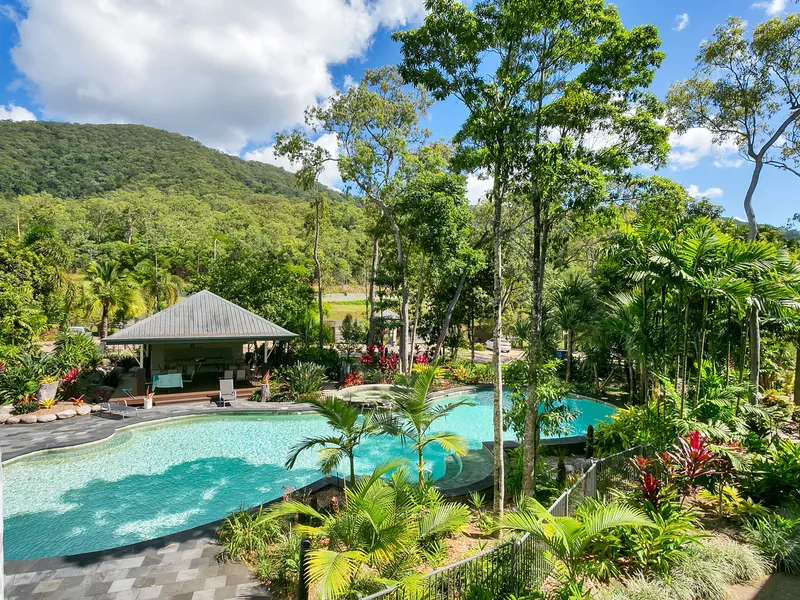 Amazing views over looking the tropical pool setting with a rainforest mountain backdrop. Modern, 2 bedroom, 2 bathrooms, study,127M2 all for $350,000