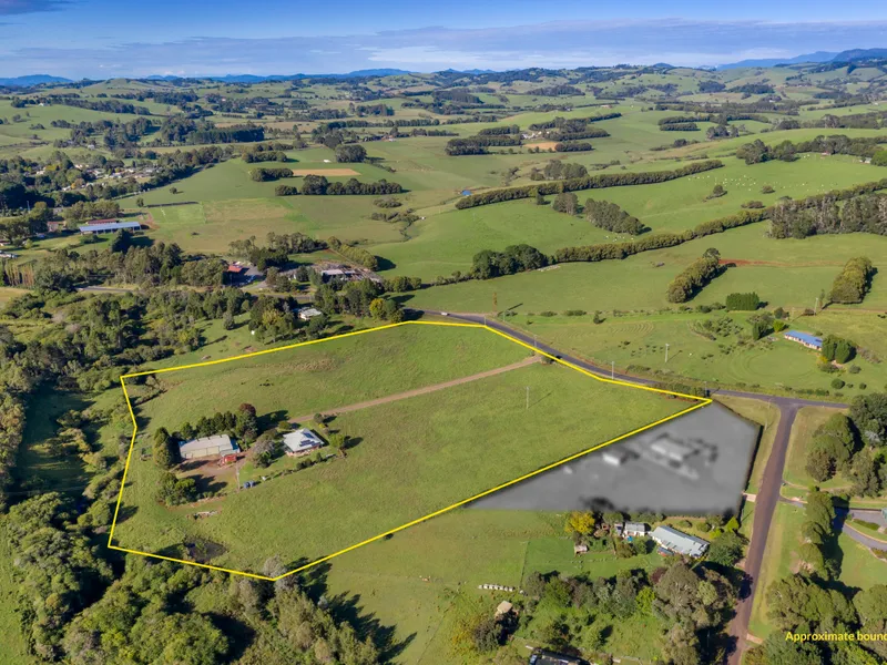 14 ACRES ON EDGE OF TOWN WITH SUBSTANTIAL INFRASTRUCTURE & CREEK FRONTAGE.