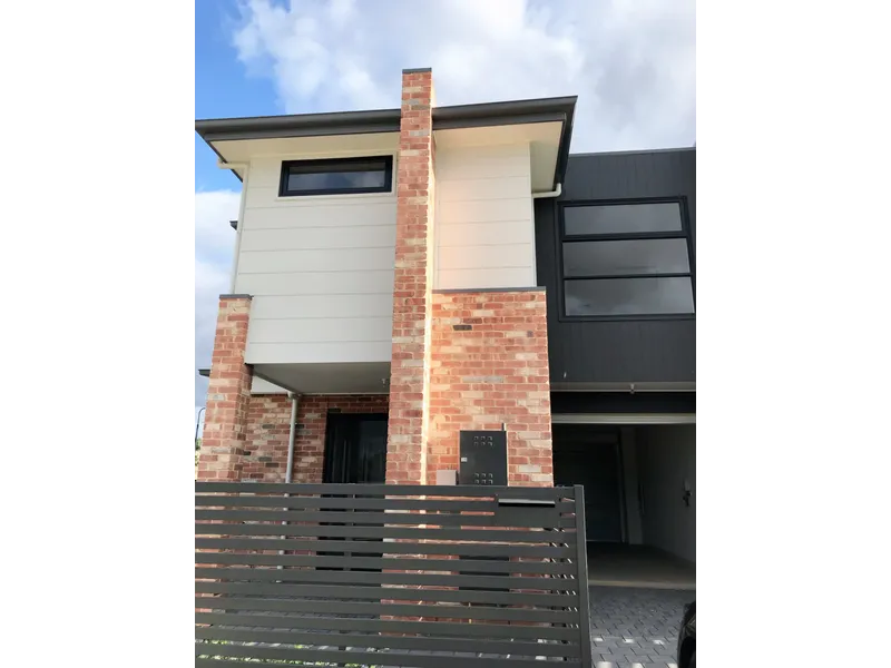 This stylish townhouse is beautifully appointed & perfectly located!