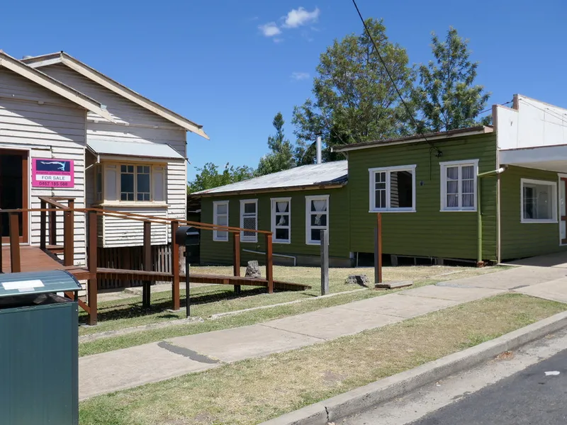 TWO BUILDINGS FOR THE PRICE OF ONE