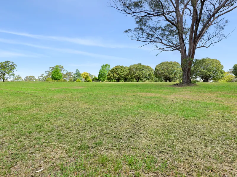 Quality acreage, large water supply and full brick home!