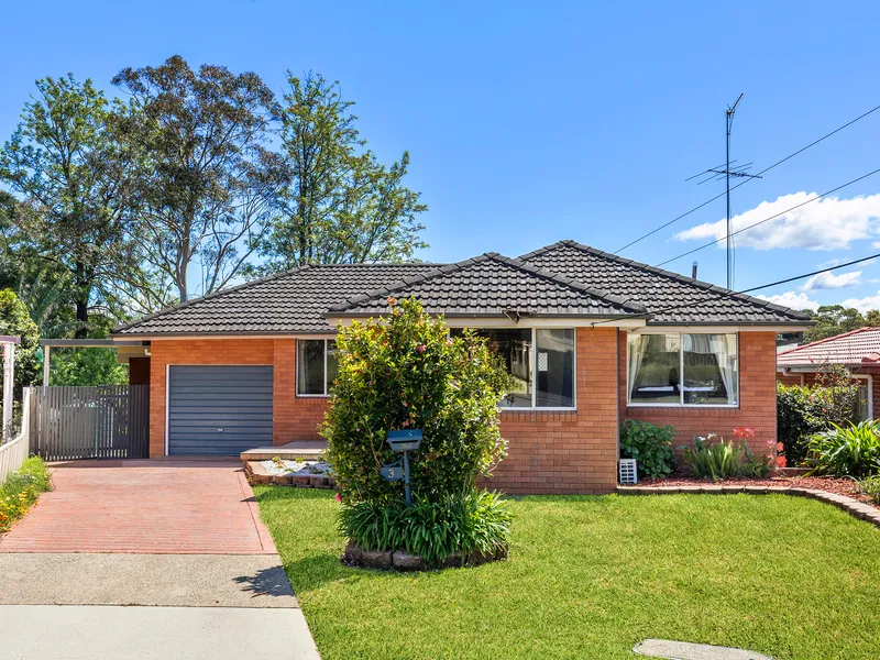 Beautiful family brick home with DA approved plans for duplex development