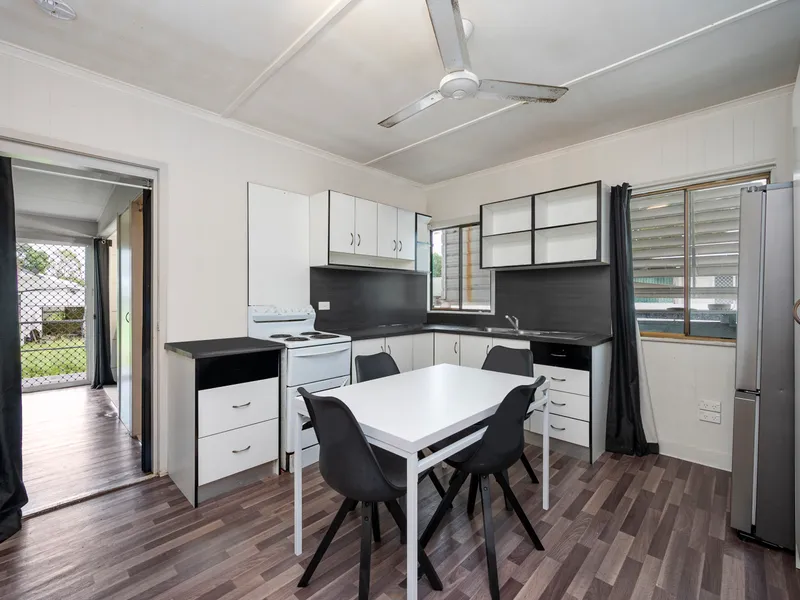 Central Location - Three Bedrooms, Two Bathrooms, and a Secure Carport!