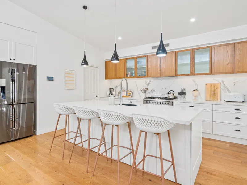 Welcome Home to Contemporary Elegance and Family Comfort!