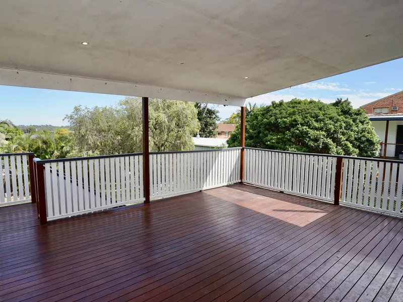 Convenient Location with a Massive deck and side access!
