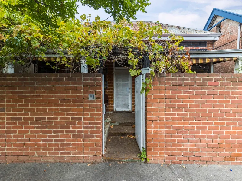 Private Bluestone character home ripe for renovating in idyllic city fringe