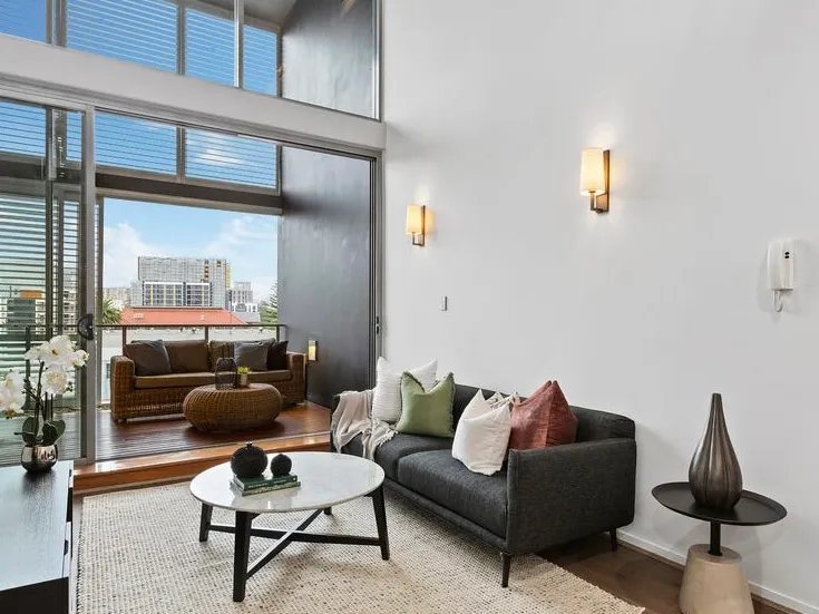 Stunning Loft-Style 1 Bedroom + Study Apartment with Parking