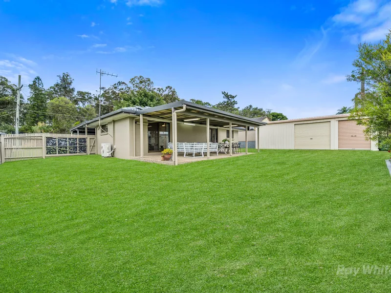 FAMILY-FRIENDLY SETTING ON 704m2 WITH MASSIVE OUTDOOR ENTERTAINING & HUGE SHED/WORKSHOP OFFERING PRIESTDALE PARK VIEWS!