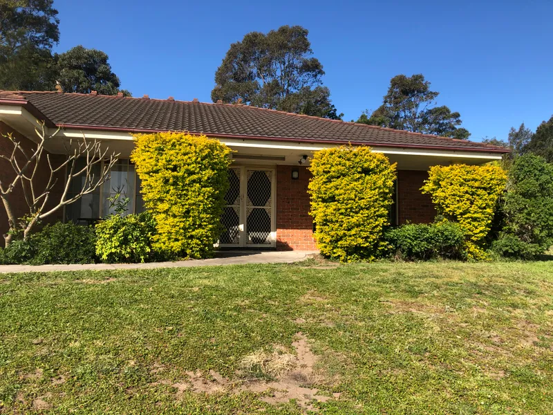 Rooms for rent in brick house in prime location.