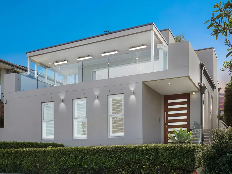 Modern Tri-Level Masterpiece Promises Luxurious Indoor/Outdoor Lifestyle