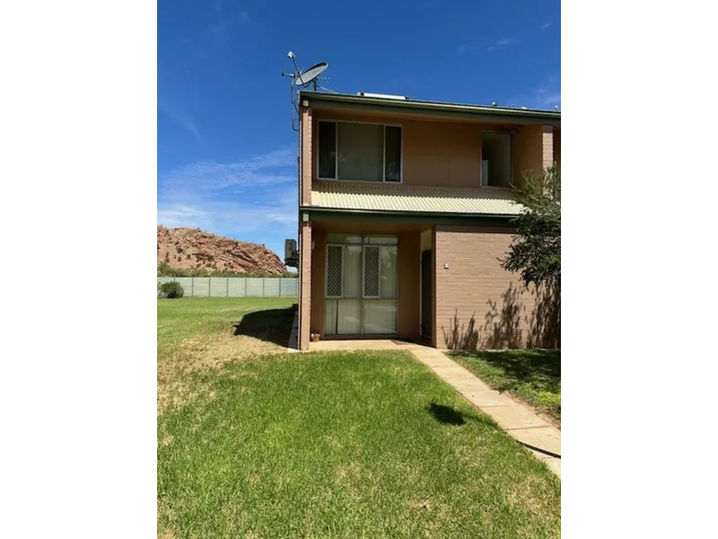 Set in quiet complex with amazing views of The Gap and Mt Gillen this unit is perfect for a professional person.