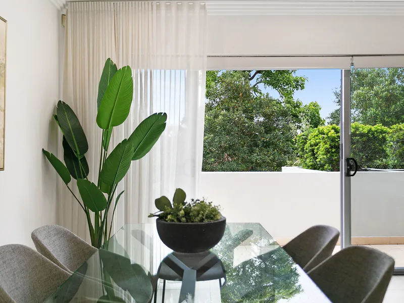 Sun washed modern home in prized riverside pocket