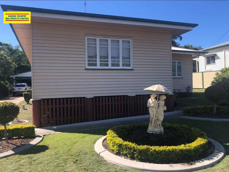 SOLID TIMBER HOME WITH A HUGE SHED COMPLETE WITH A MECHANICAL CAR SERVICE PIT