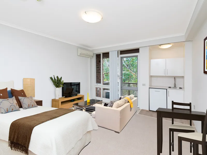 Renovated serviced studio apartment offers blissful native bushland outlook