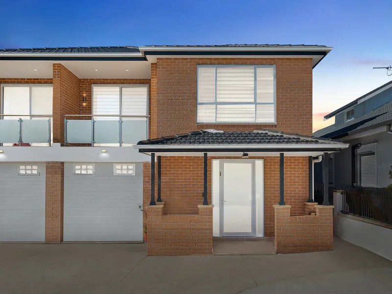 Spacious & Sophisticated Brick Family Home in Blue Ribbon Locale