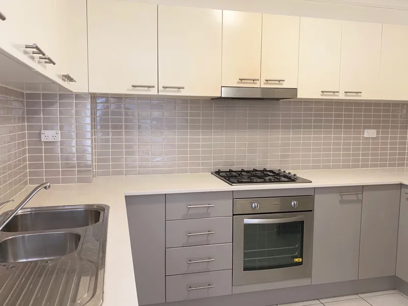 Two bedroom unit on first floor with swimming pool to complex