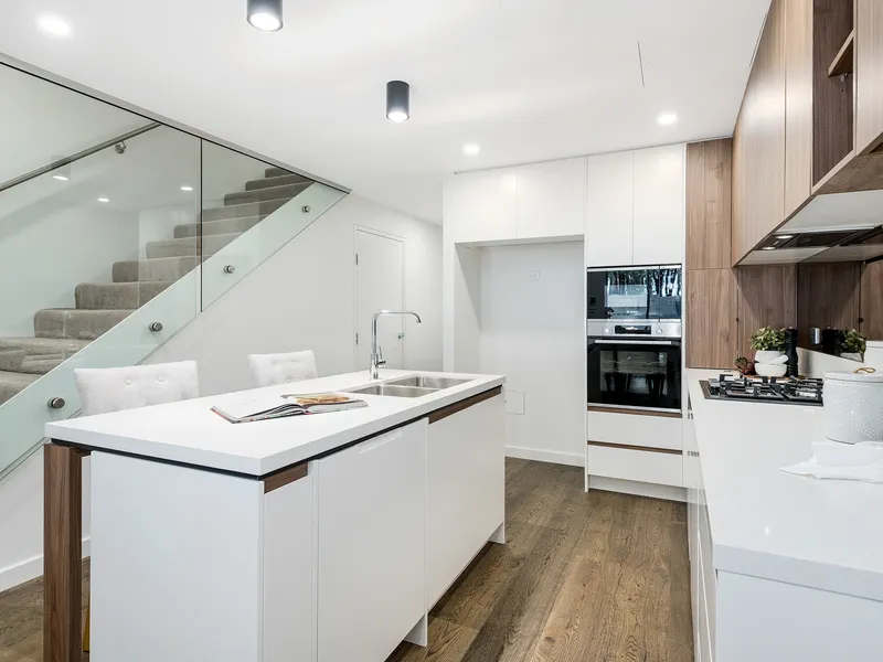 Brand new with high end finishes in a prime location