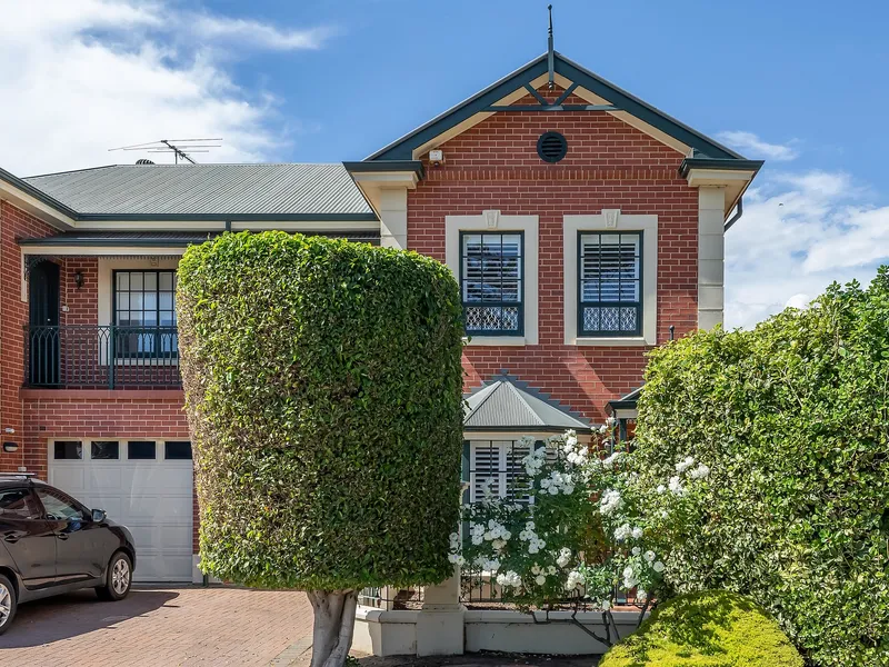 Stately townhouse living meets relaxed beach surrounds in Glenelg North