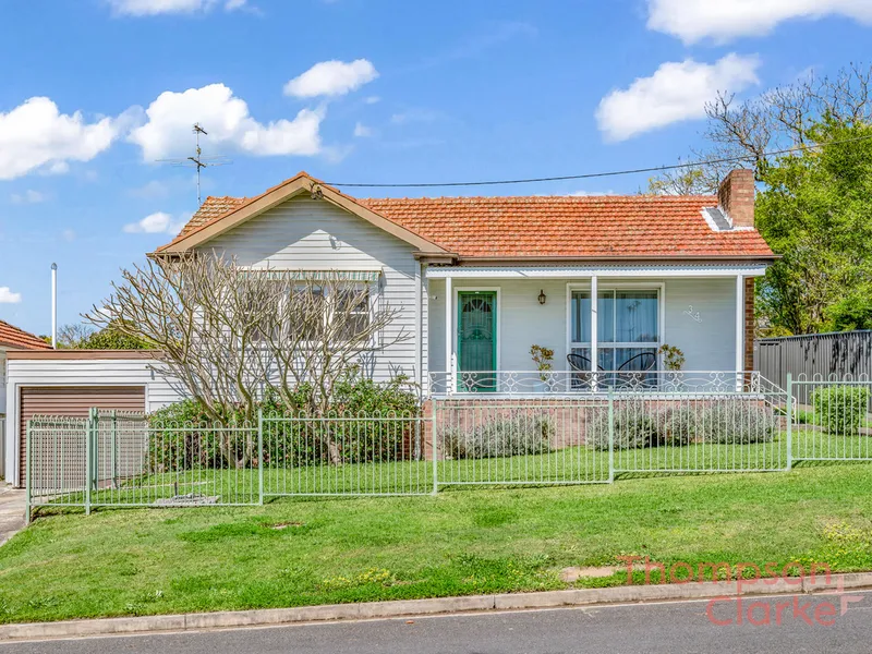 COTTAGE HOME WITH CHARACTER & CHARM!