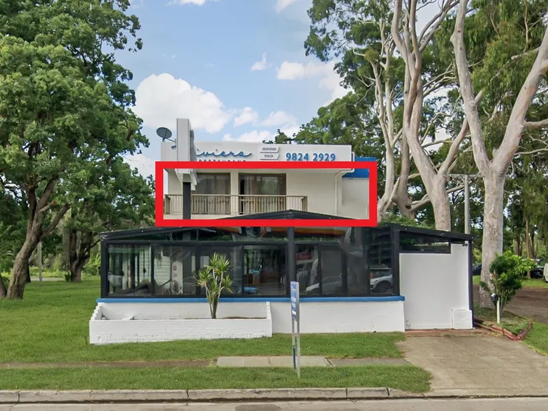 Modern, private and updated apartment set above local restaurant