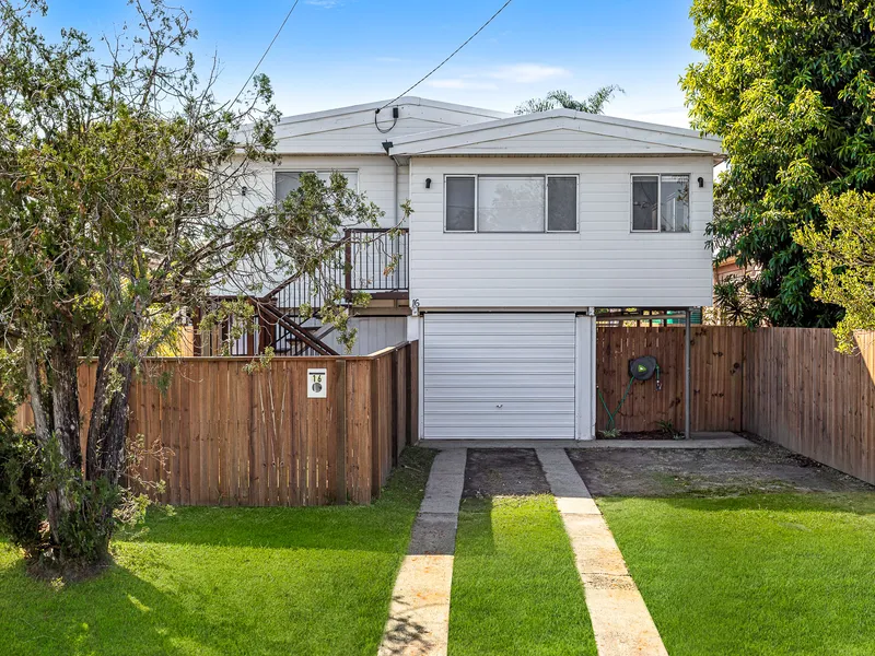 Renovated family home with through access and BIG shed!