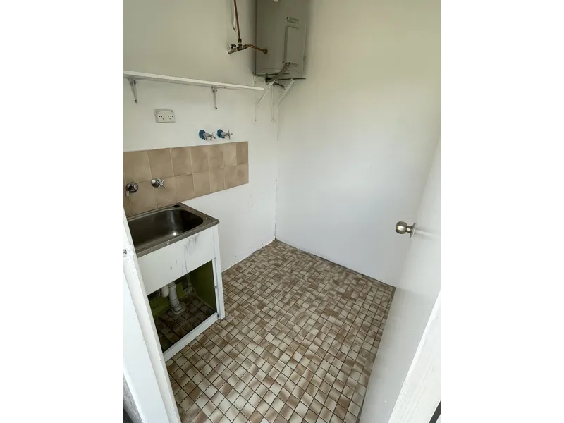 Centrally Located, Private, Sun-Kissed One Bedroom Duplex Forming Part of A House