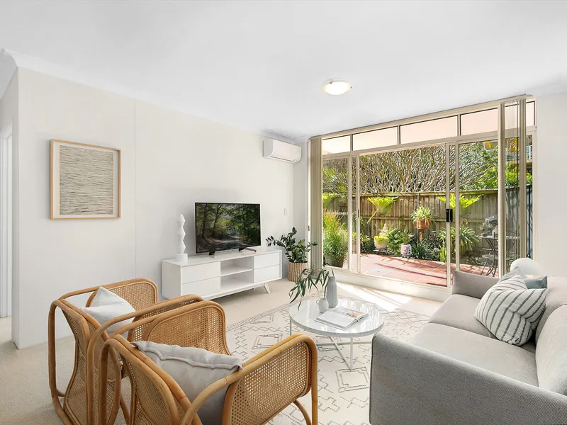 Beachside courtyard apartment bathed in sunshine