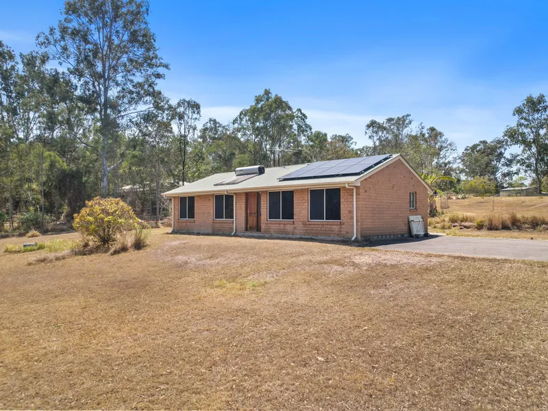 4 Bedroom home with 3 bay shed on large block