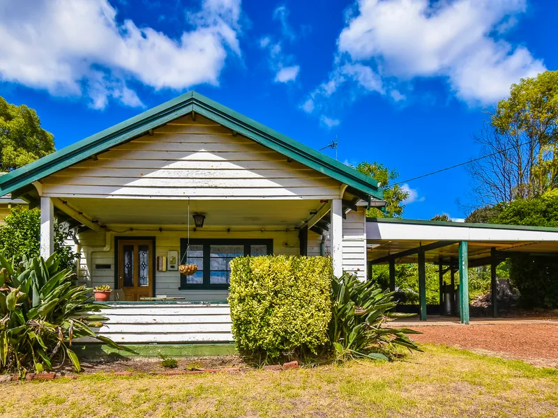 CHARACTER HOME ON QUARTER OF AN ACRE