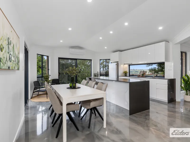 STYLISH FAMILY HOME ON OVER A QUARTER ACRE WITH WATER VIEWS!