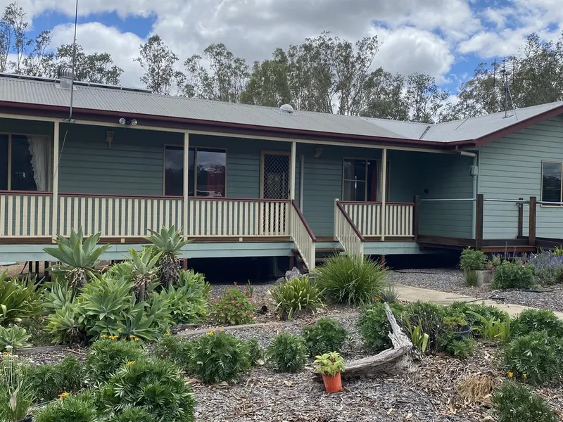 Looking for a home that offers, comfort, acreage, sheds, dog pens and fencing along with a lovely home and fabulous back deck/outdoor living.