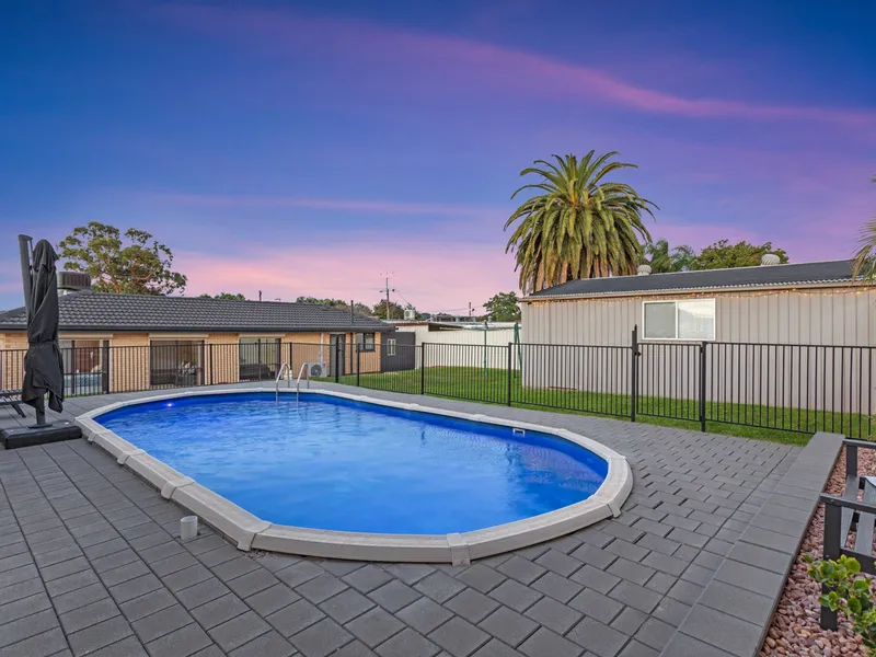 PERFECT FAMILY HOME WITH SPARKLING IN-GROUND SWIMMING POOL!