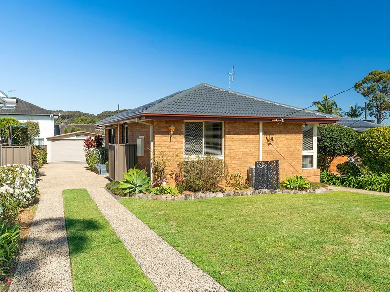 Family Home Filled with Potential Moments From The Lake