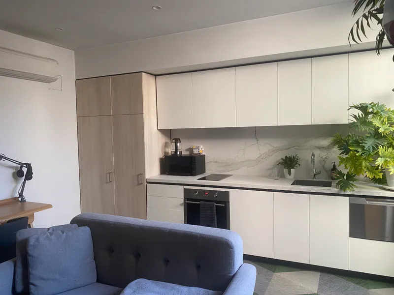 STUNNING DESIGN-BUILD APARTMENT - ONLY ONE OF 6 - WITH PRIVATE DECKED OUTDOOR AREA & HEATING & COOLING!