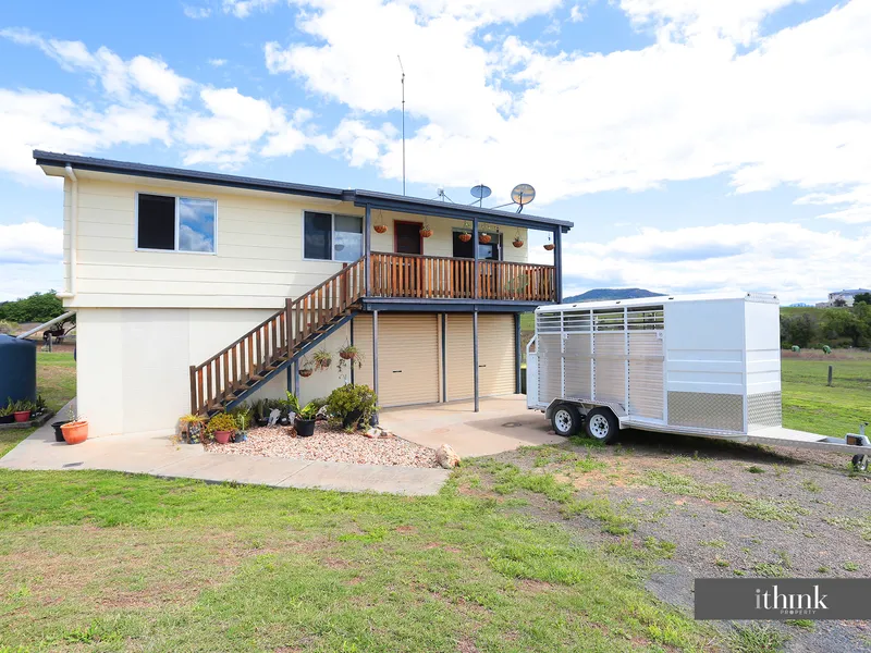 Just Over 7 Acres with town water MOTIVATED SELLERS- BRING OFFERS!