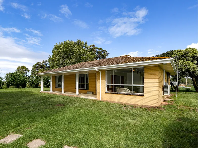 SOLID BRICK HOME ON HALF AN ACRE