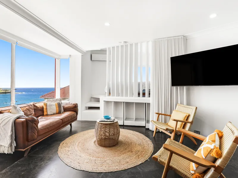 Designer Style with Spectacular Beach Views & Parking