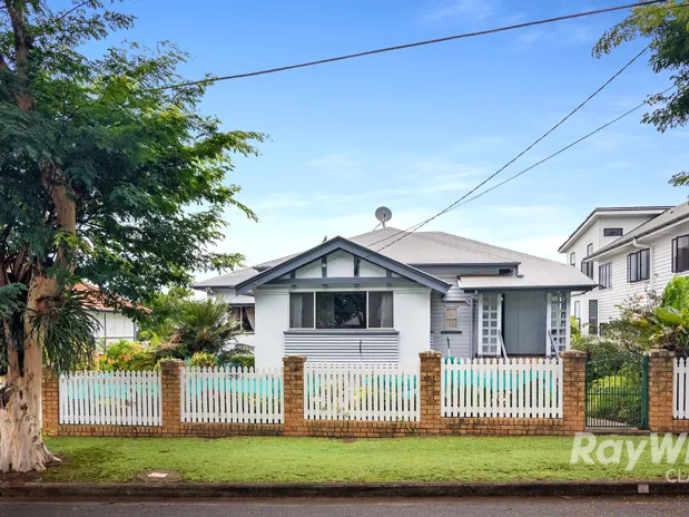 Meticulously Maintained Pre-war Home with City Views