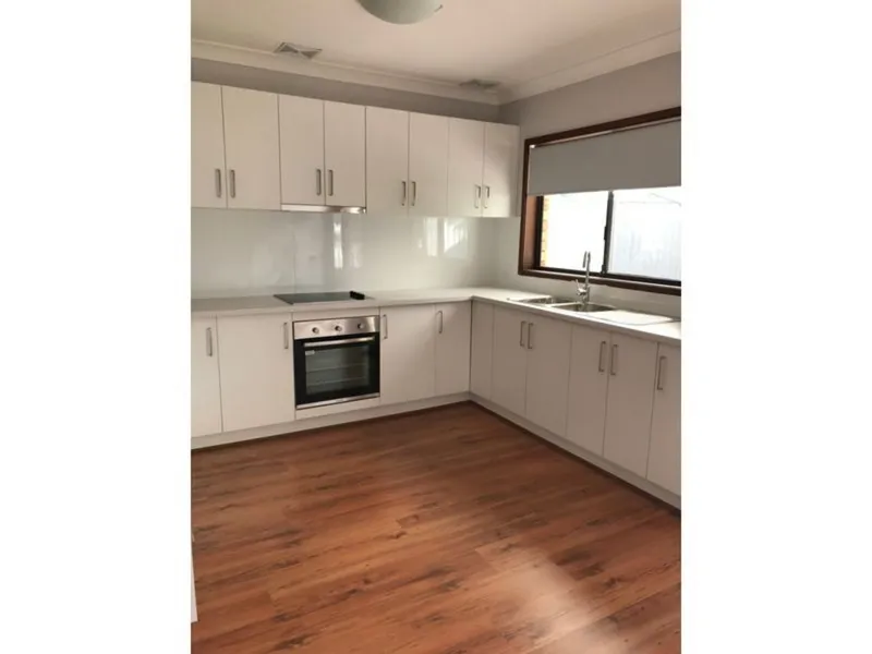 ATTRACTIVE TWO BEDROOM TOWNHOUSE IN QUIET COMPLEX