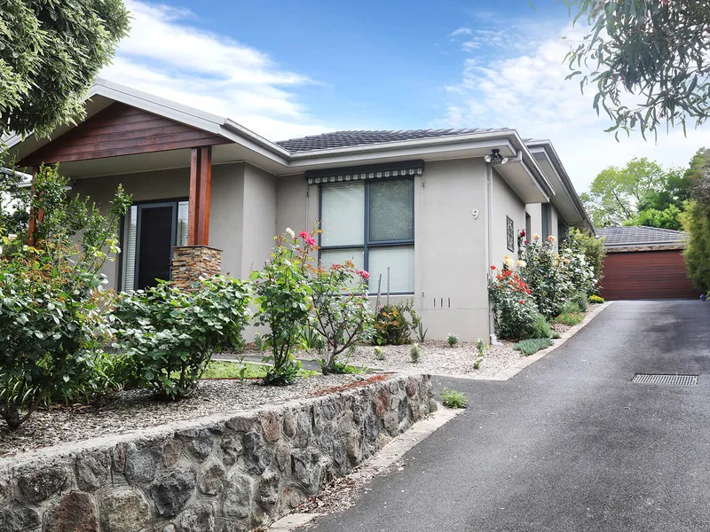 This lovely home is sure to impress! Low maintenance living