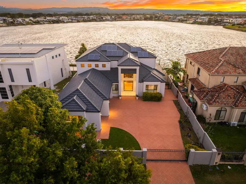 Captivating Lakefront Two-Level Home on 920m² Block with Uninterrupted Water & Hinterland Views