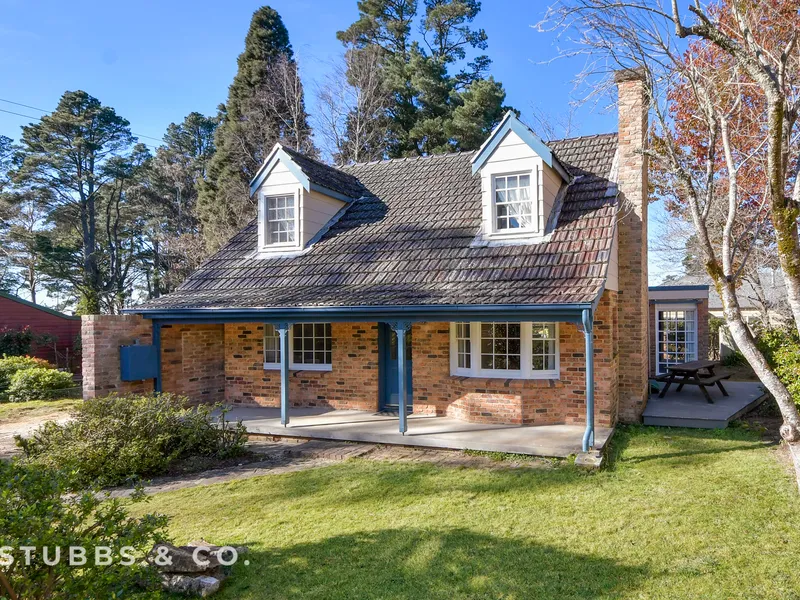 Immaculate brick home with the option of a fourth bedroom