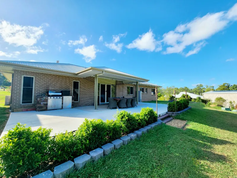 IMMACULATE HOME ON ACREAGE