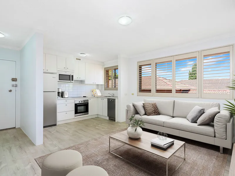 Renovated two bedroom unit located on the doorsteps of Eastwood Train Station with a North East aspect