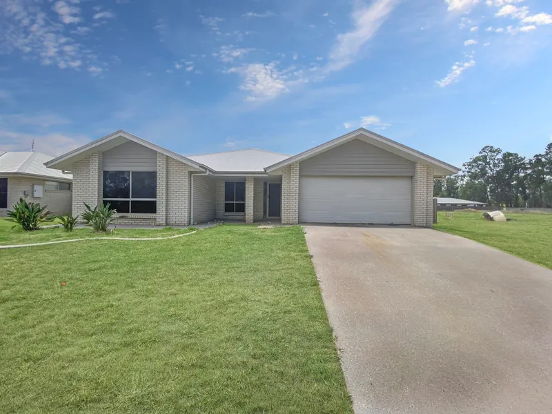 The perfect family home... Modern, Spacious with a Big Back yard!