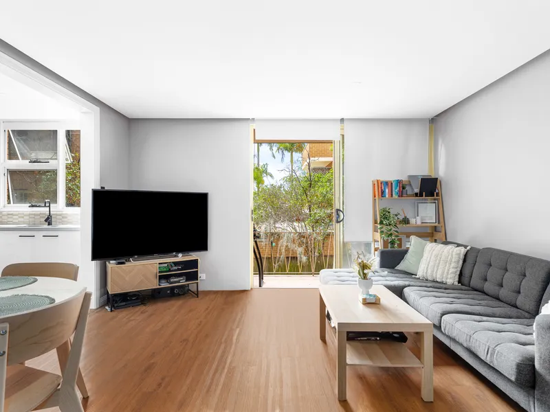 MODERN LOW MAINTENANCE APARTMENT WITHIN A WALK OF THE BEACH