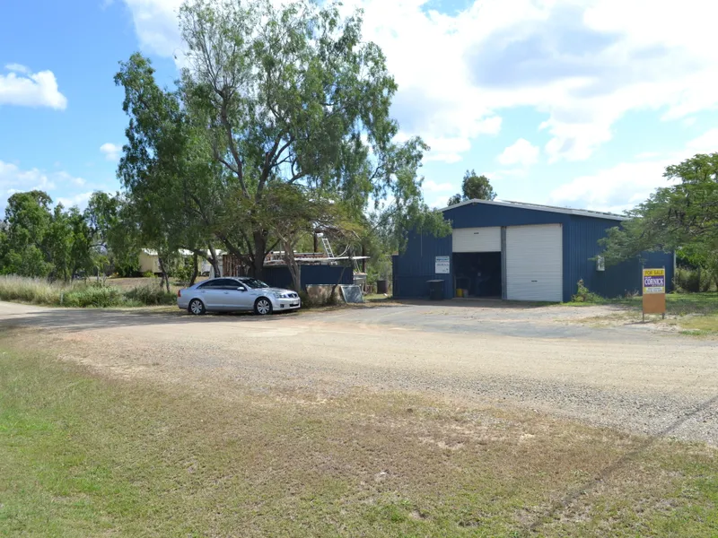 River Frontage Acreage With Business Edge